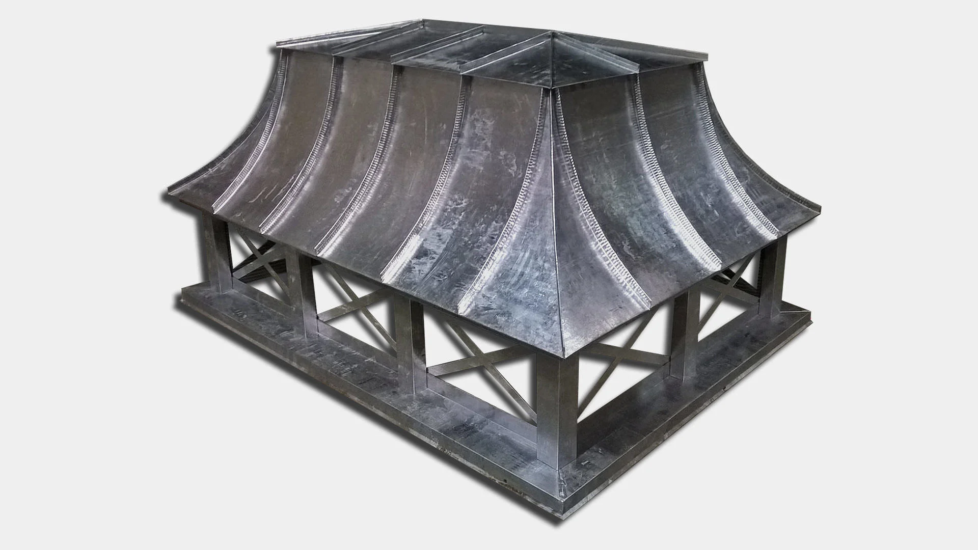 Lead coated copper chimney cap with concave metal roof panels