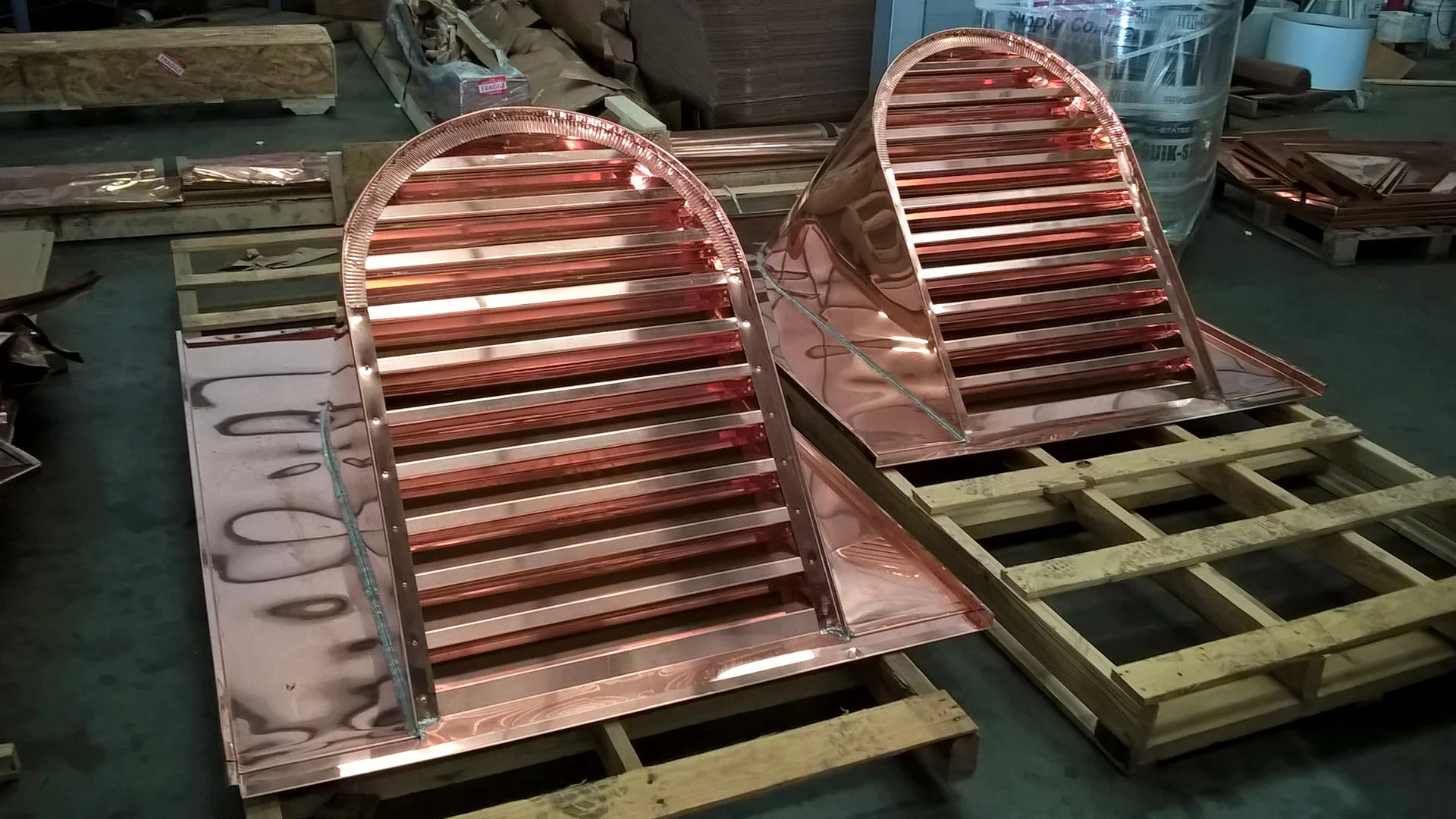 Custom louvered copper barrel dormers