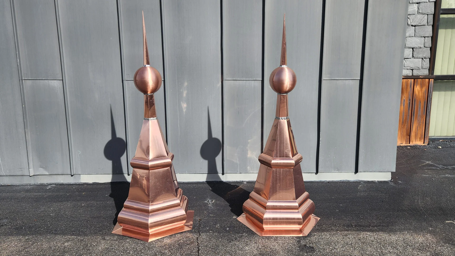 The half century copper finials